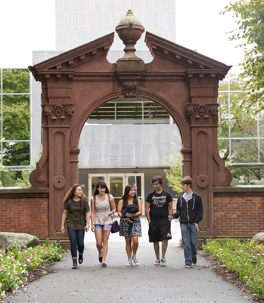 Students walking in front of the Ramapo Arch